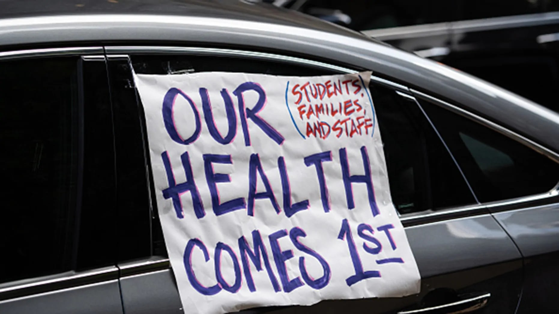 Chicago Teachers Union members and supporters join a car caravan outside Chicago Public Schools (CPS) headquarters while a Chicago Board of Education meeting takes place inside in Chicago, IL on July 22, 2020. (Photo by Max Herman/NurPhoto via Getty Images) (Getty Images)